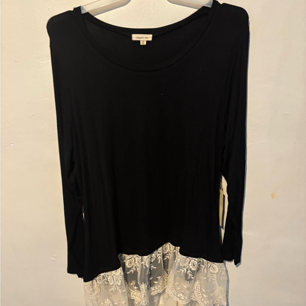 Black long sleeve with cream lace bottom.